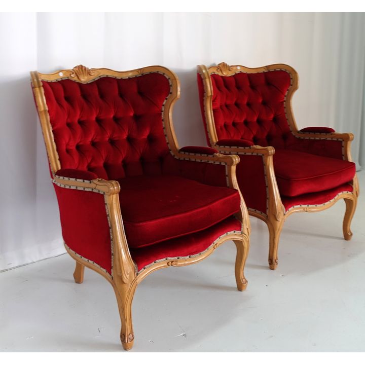 PAIR OF UPHOLSTERED CARVED ARMCHAIRS