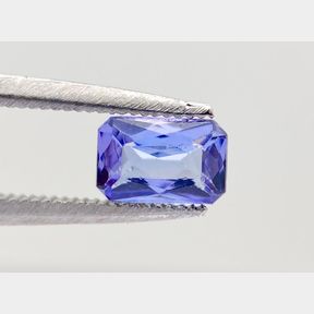 0.626CT EMERALD CUT TANZANITE .VIOLET BLUE .GEM LAB CERTIFIED