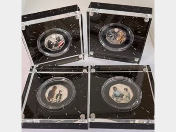 SET OF FOUR SILVER PROOF COLOURED 'STAR WARS' 50 PENCE COINS