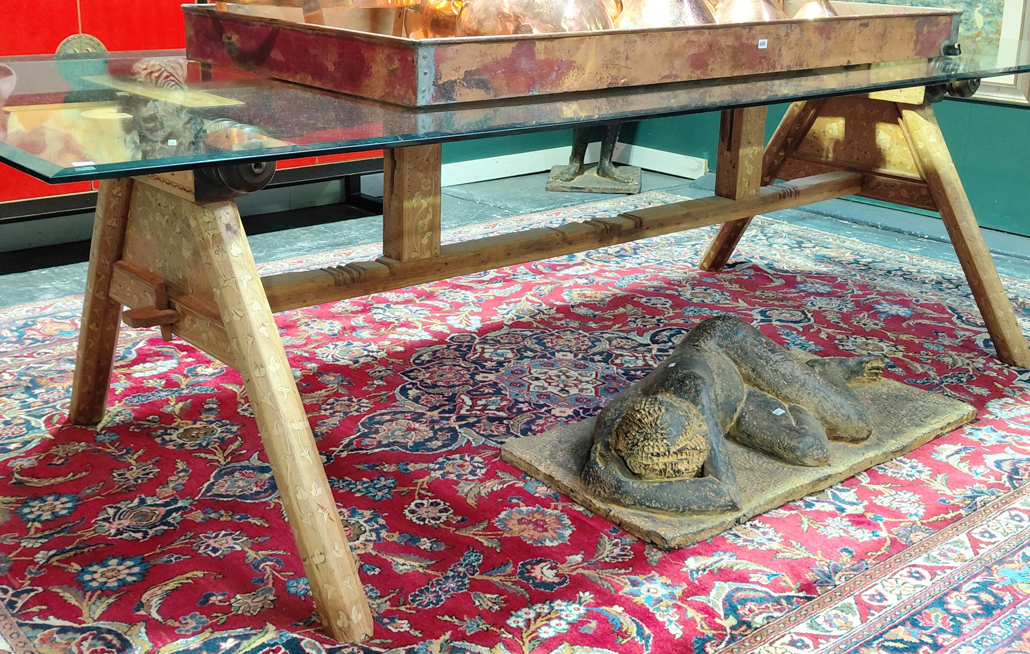 THE MAHARAJA EXHIBITION GLASS TOP TABLE
