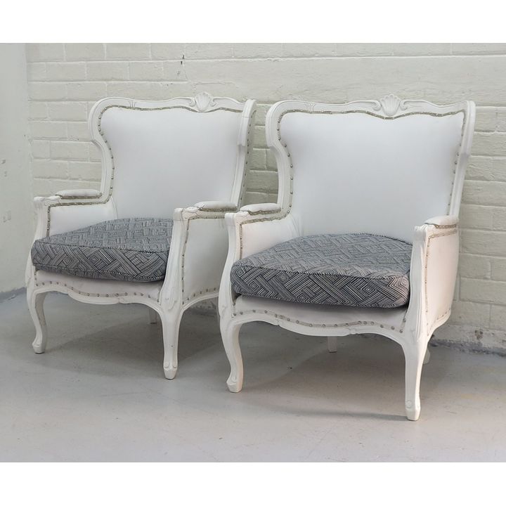 PAIR OF UPHOLSTERED ARMCHAIRS