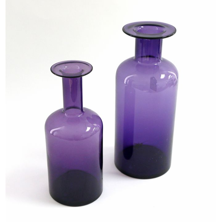 Two vintage Scandinavian purple glass bottles