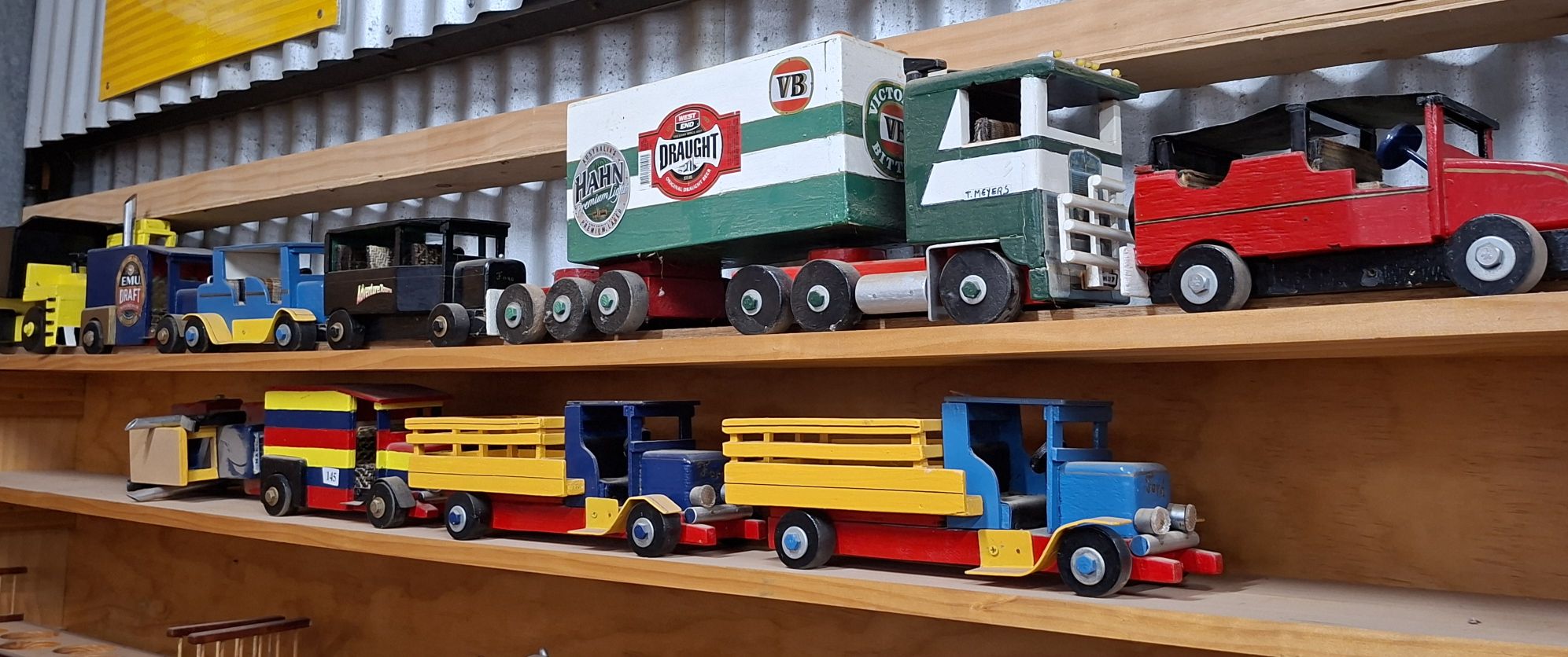 145 · WOODEN TRUCKS AND CARS