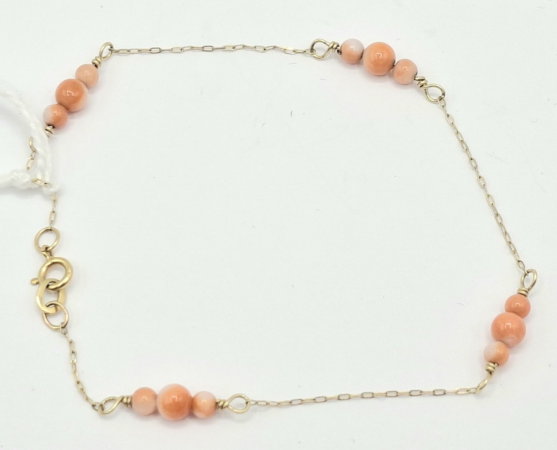 1118 · 14CT GOLD CORAL BRACELET