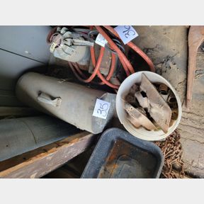 Galvanized tool box and bucket of pipe fittings