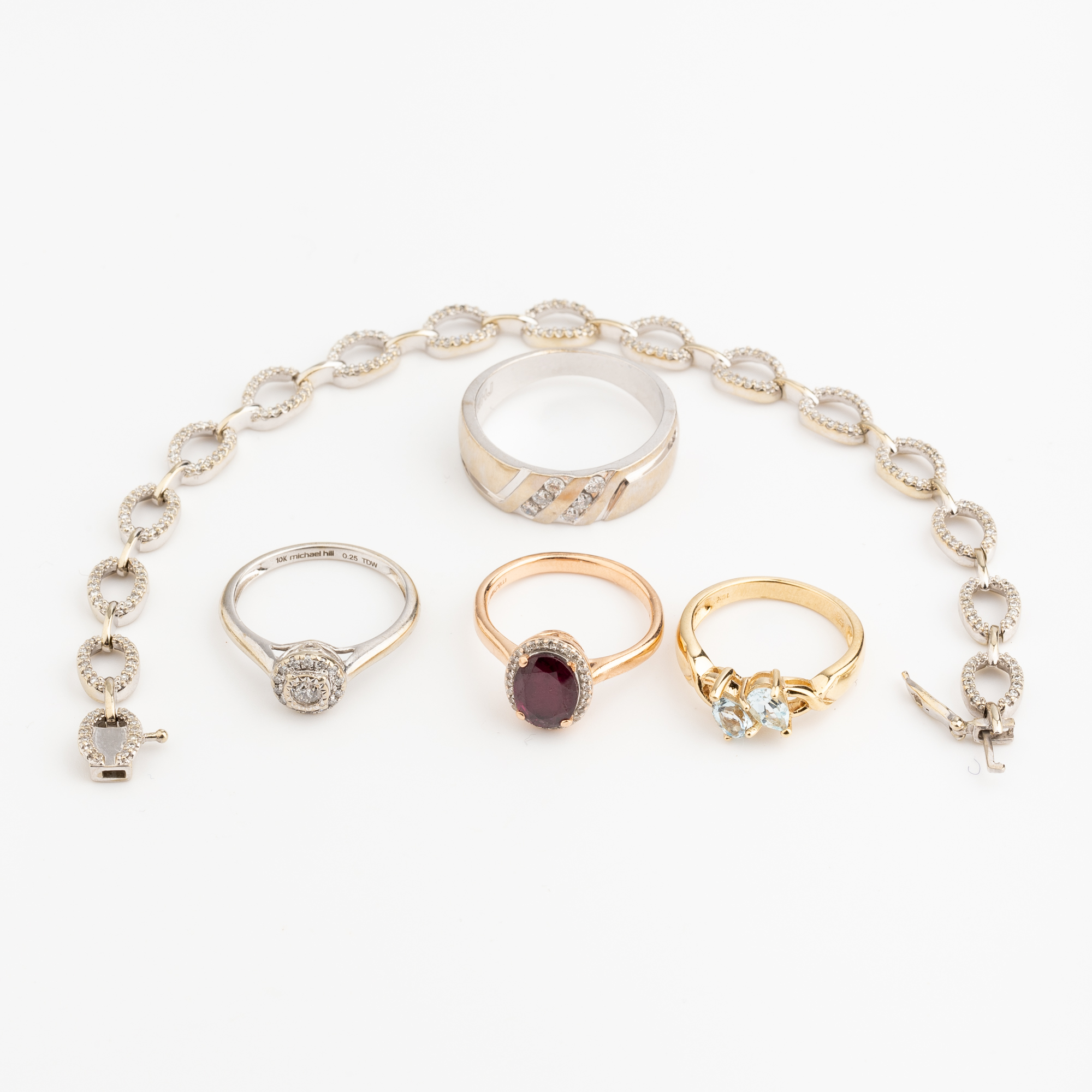15 · 10ct Gold Diamond & Gemstone Rings & Bracelet