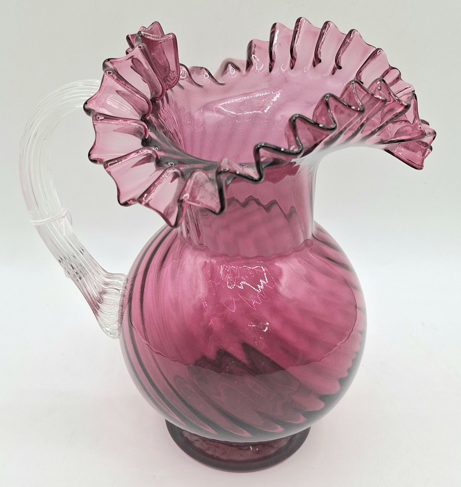 149 · LATE VICTORIAN CRANBERRY GLASS WATER JUG