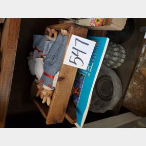 Antique doll rocking crib and some clothed animals
