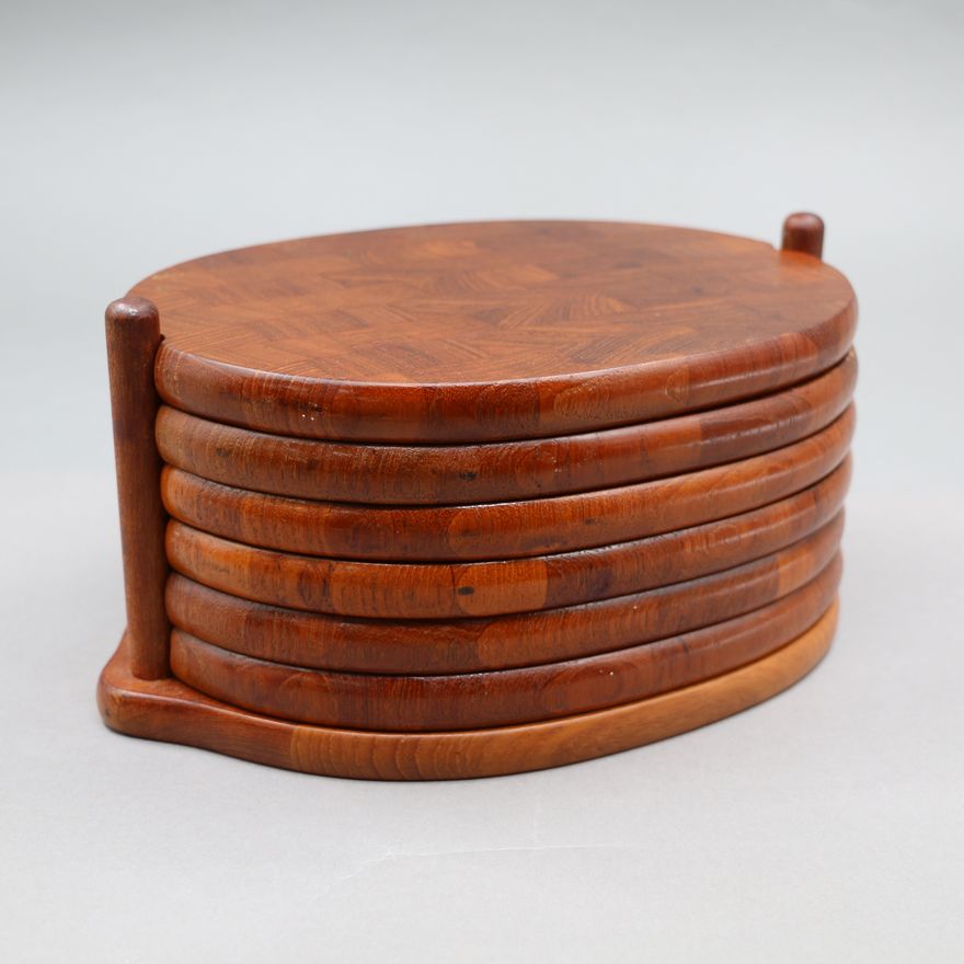 Jens Quistgaard for Digsmed, Denmark - Set of six stacked trivets and stand