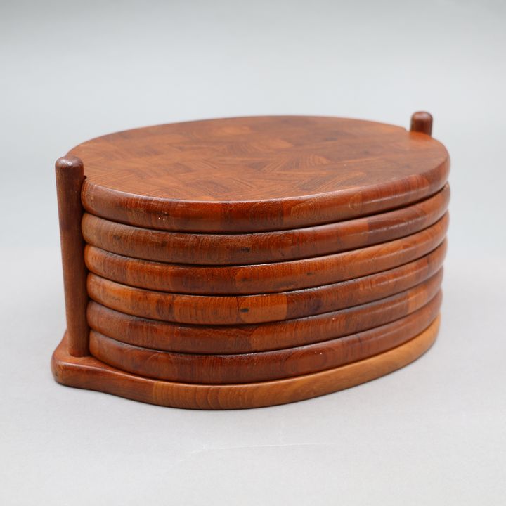 Jens Quistgaard for Digsmed, Denmark - Set of six stacked trivets and stand