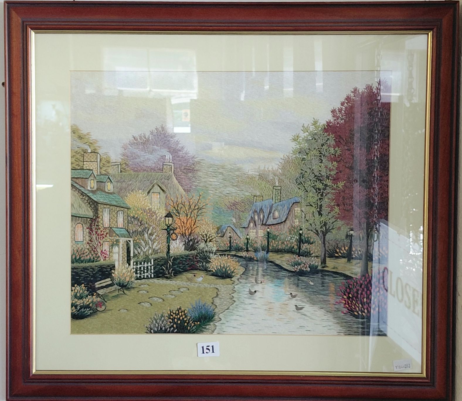 151 · FRAMED EMBROIDERY COTTAGE SCENE