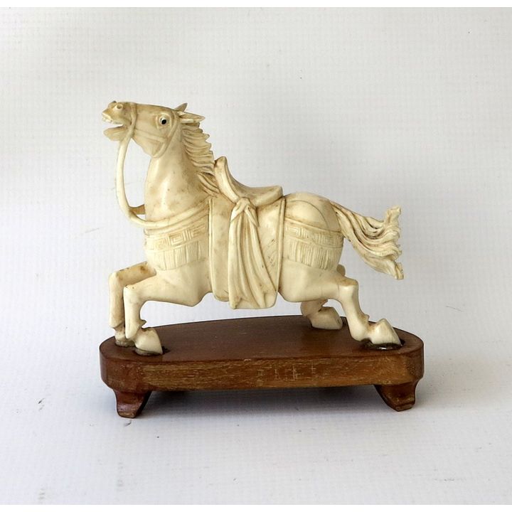 JAPANESE CARVED IVORY HORSE ON WOODEN STAND