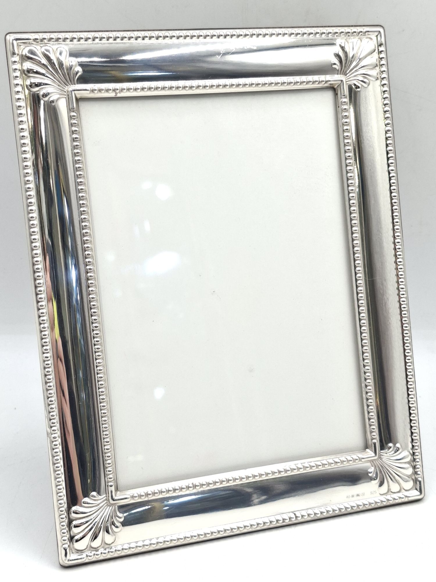 153 · A STERLING SILVER PHOTOGRAPH FRAME