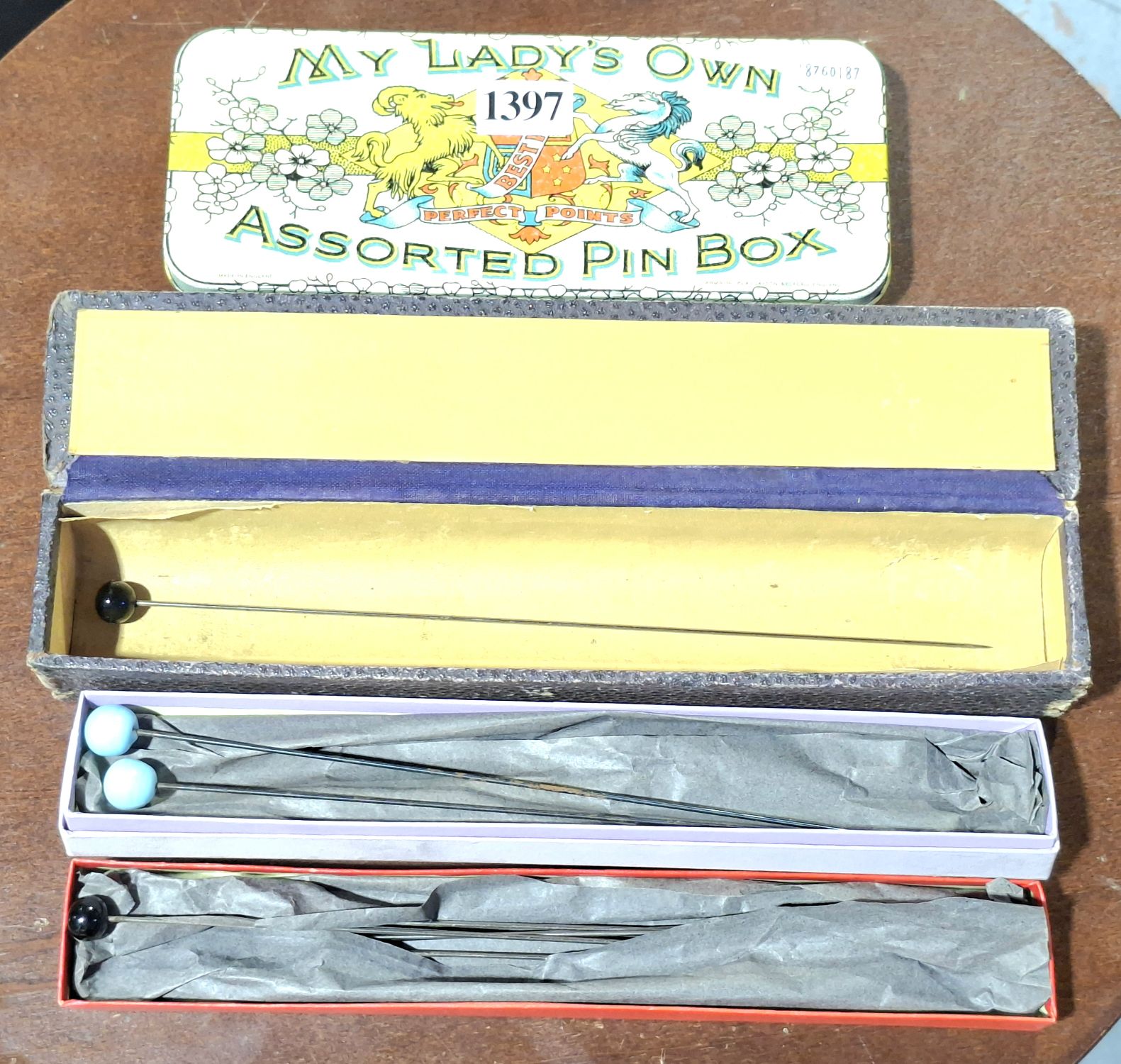 1397 · VINTAGE GLASS ENDED HAT PINS AND CASES