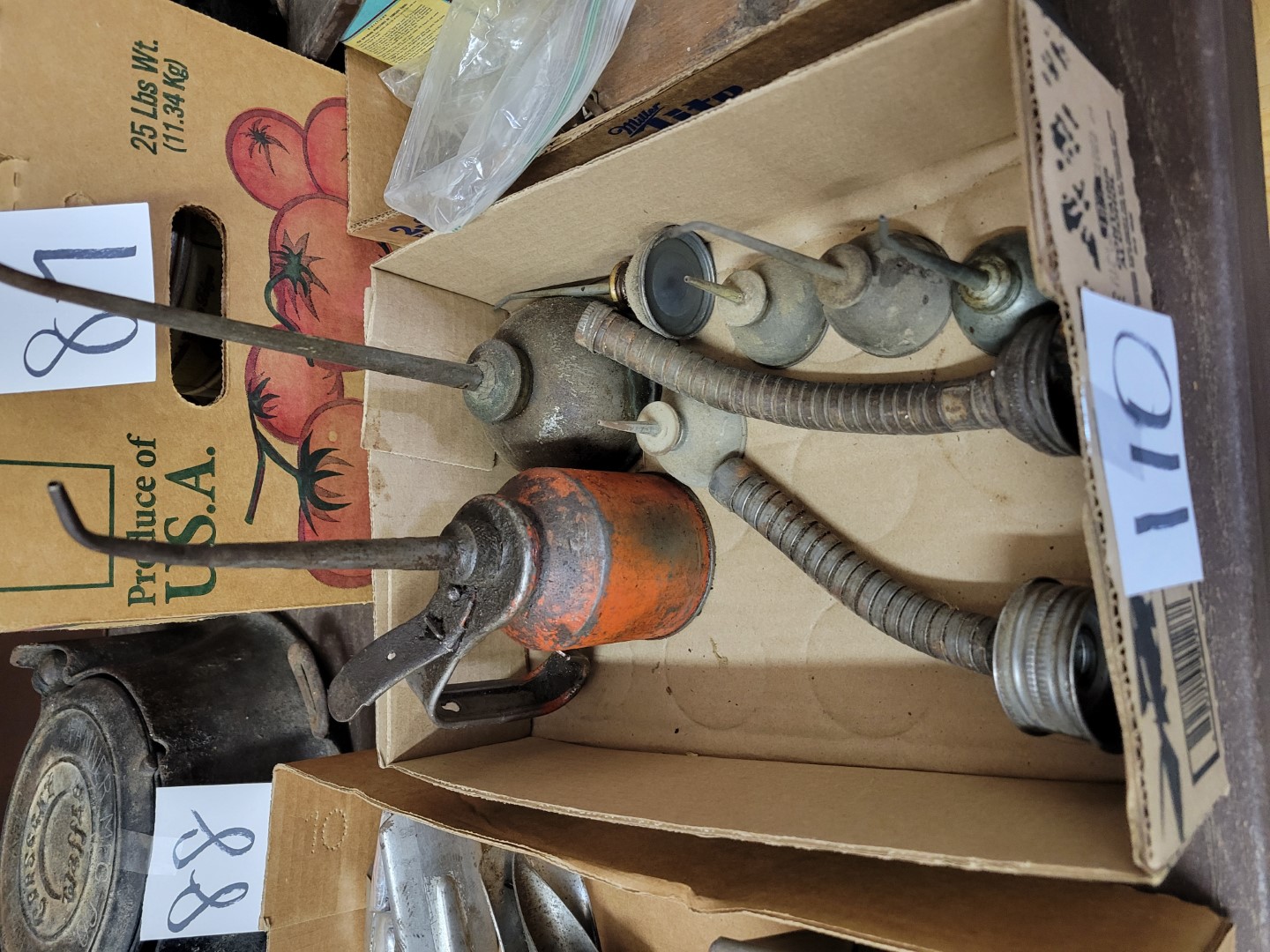 Vintage Oil Cans and Funnels Midwest Auctions, LLC