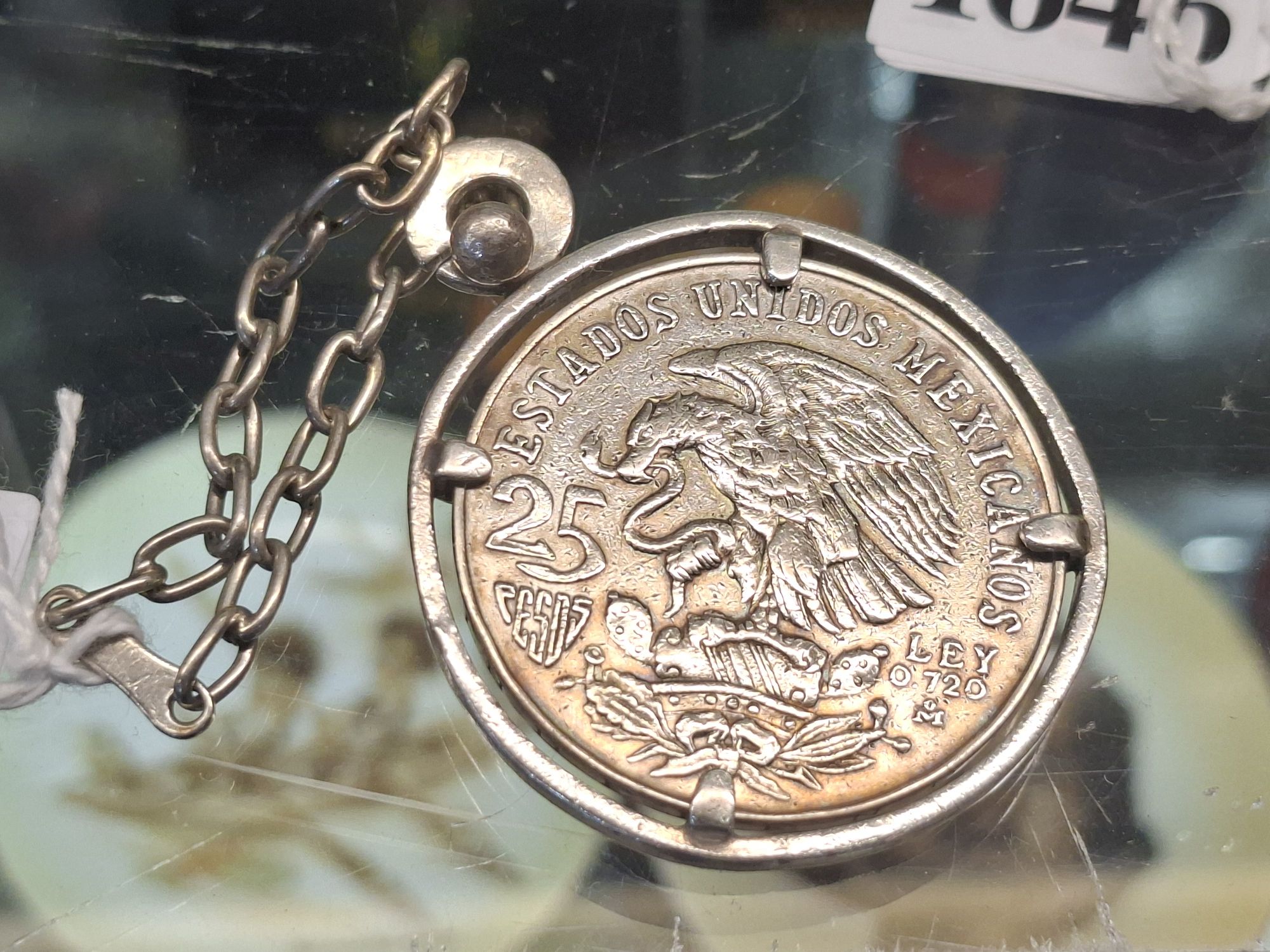 MEXICAN OLYMPIC COIN IN SURROUND