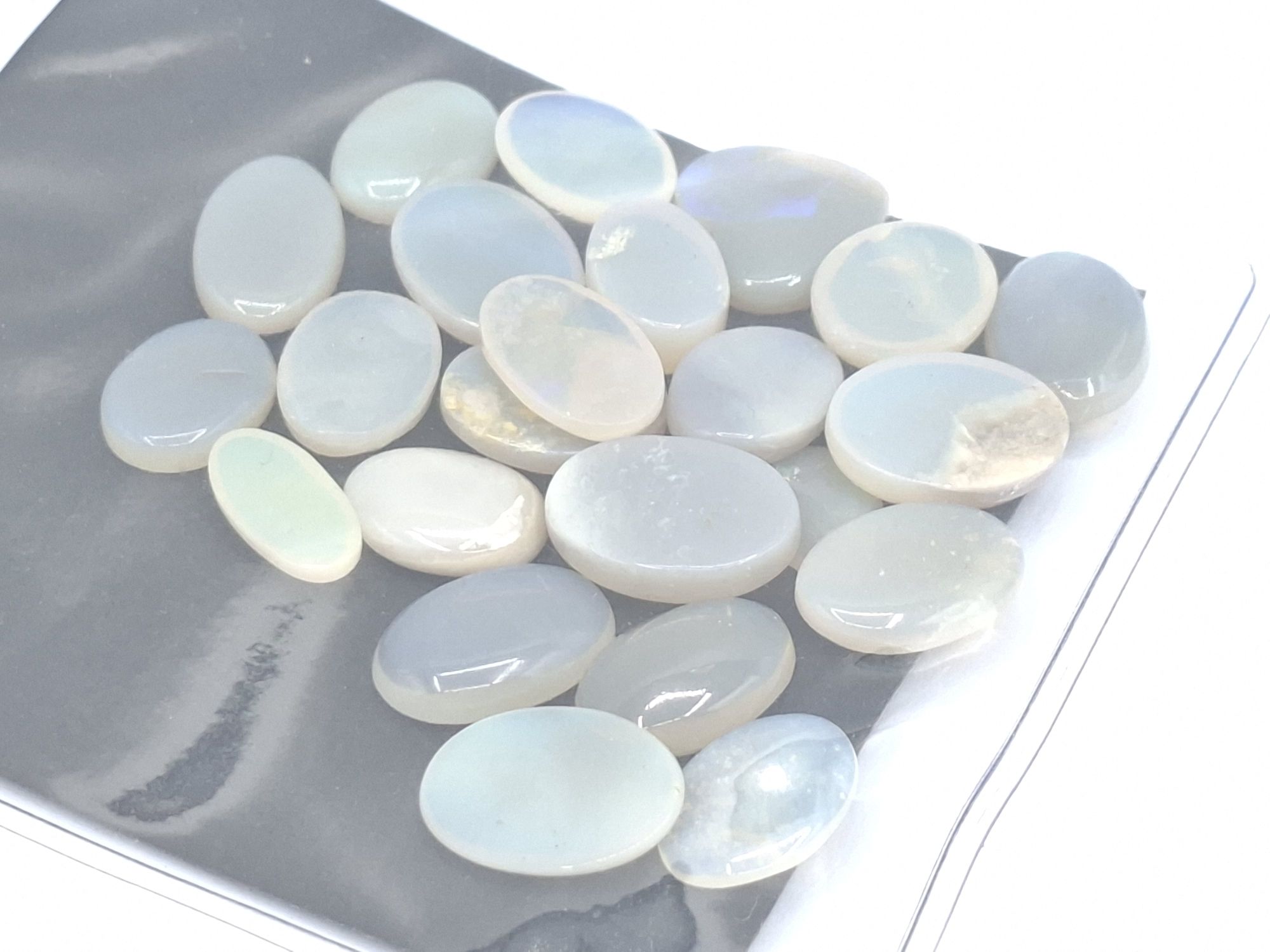 74 · OPAL SOLIDS GEMSTONES