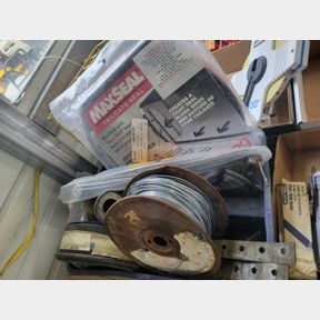 Plastic container stainless zip ties, wire, tailgate seal, frame clamp, other