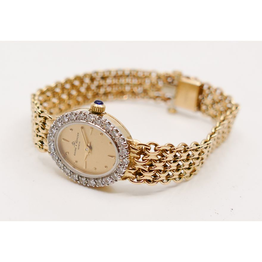 Baume & Mercier 14K Gold and Diamond Bezel Ladies Wristwatch.