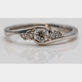 0,180CT DIAMONDS IN 9CT BROWNS WHITE GOLD RING - 51929/12778