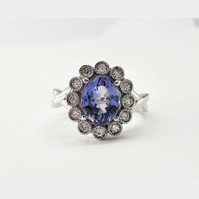 1.928CT TANZANITE AND .275CTS DIAMONDS COLOUR H/I CLARITY VS/SI IN 18CT WHITE GOLD RING - 6.4 GRAMS - 51620/263