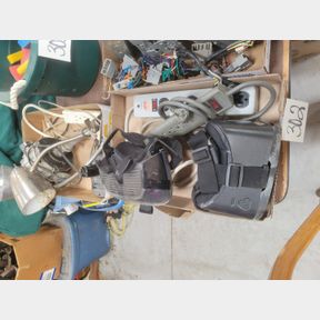 2 Boxes of power strips, clamp on lights and electronic distributer