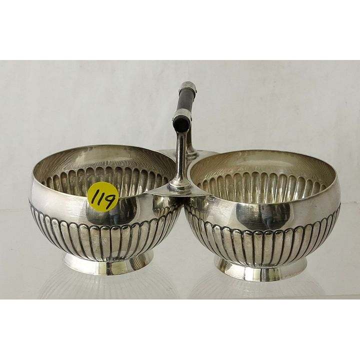 AN EARLY 200TH CENTURY SILVERPLATED TWO BOWL BASKET.