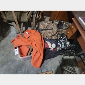 Container of Vintage Skirts Jackets and Other Travel Bags