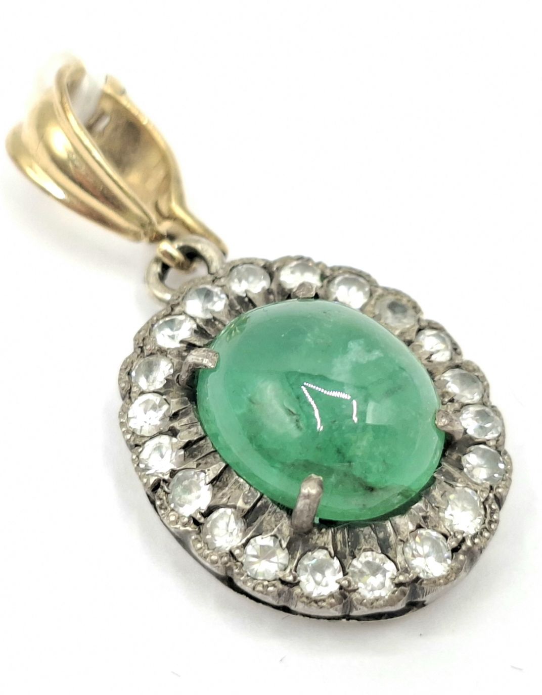 1137 · 9CT GOLD AND SILVER STONE SET PENDANT
