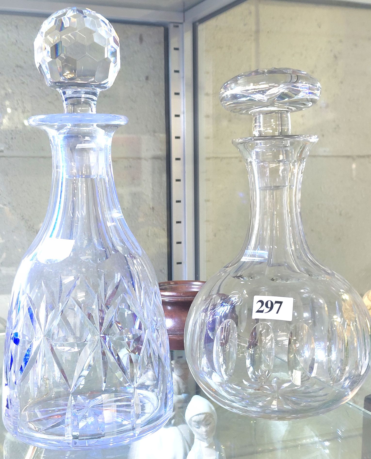 297 · TWO CRYSTAL DECANTERS