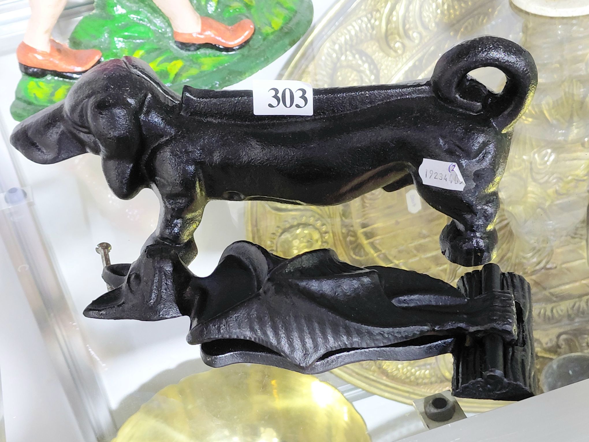 303 · CAST IRON BOOT SCRAPER AND DOOR KNOCKER