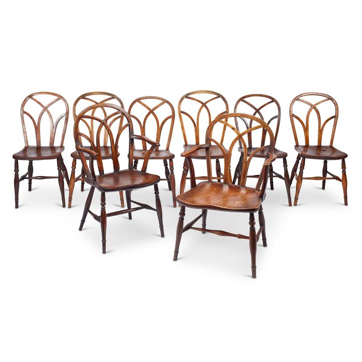A matched set of eight George IV ‘Gothic’ Windsor chairs, Buckinghamshire