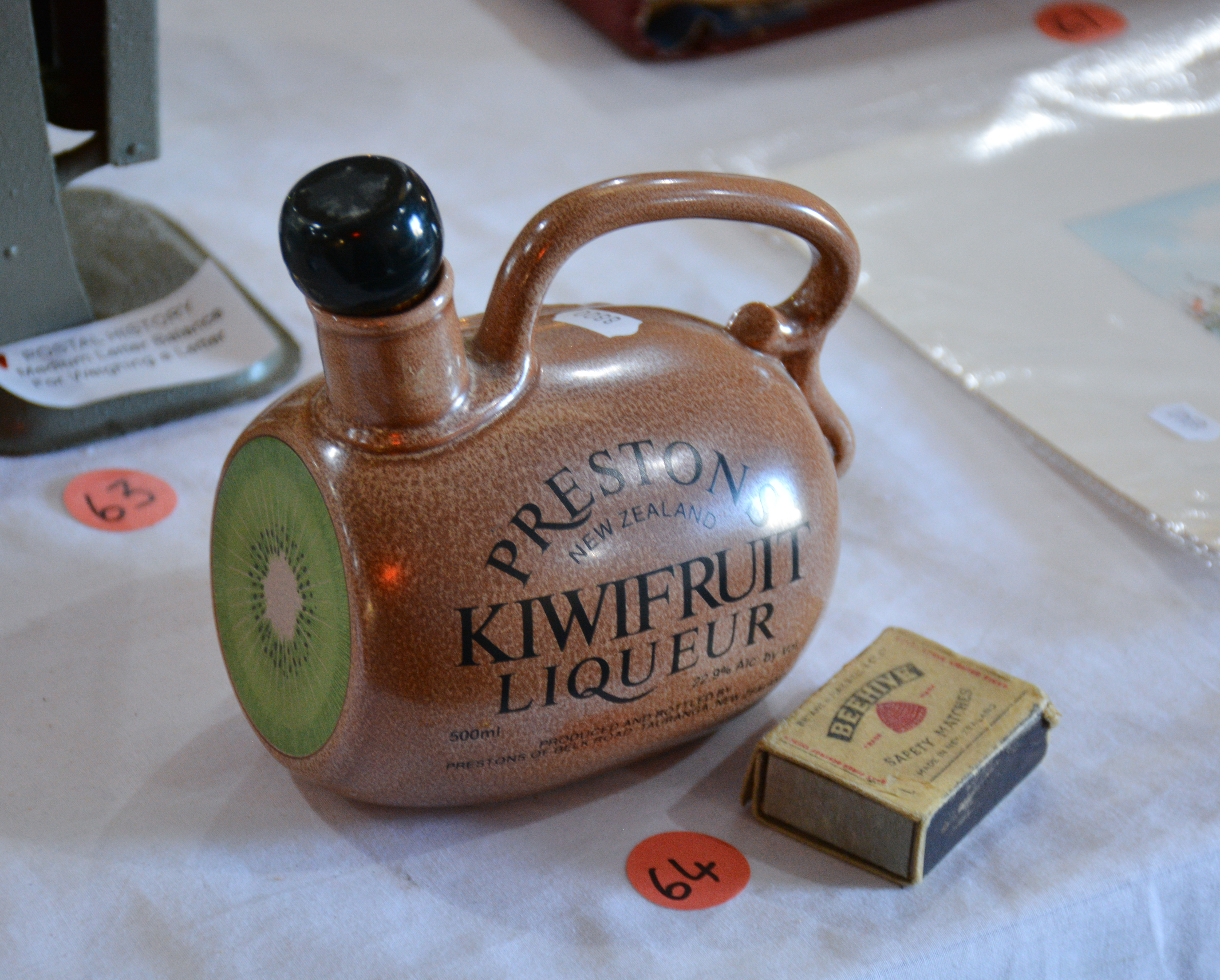 Crown Lynn 1985-89 Presto Kiwifruit Liquour Bottle — NZ auction result