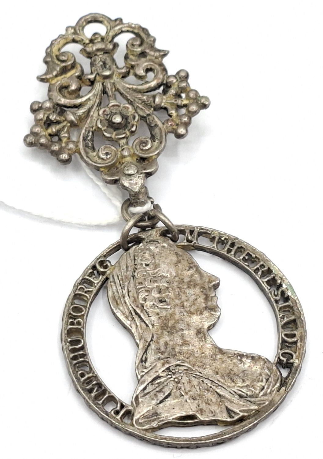 1051 · ANTIQUE COIN BROOCH