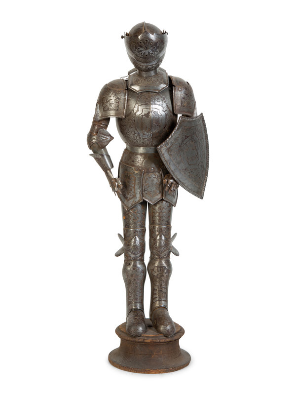 A Miniature Suit of Medieval Armor
Height overall 20 inches.