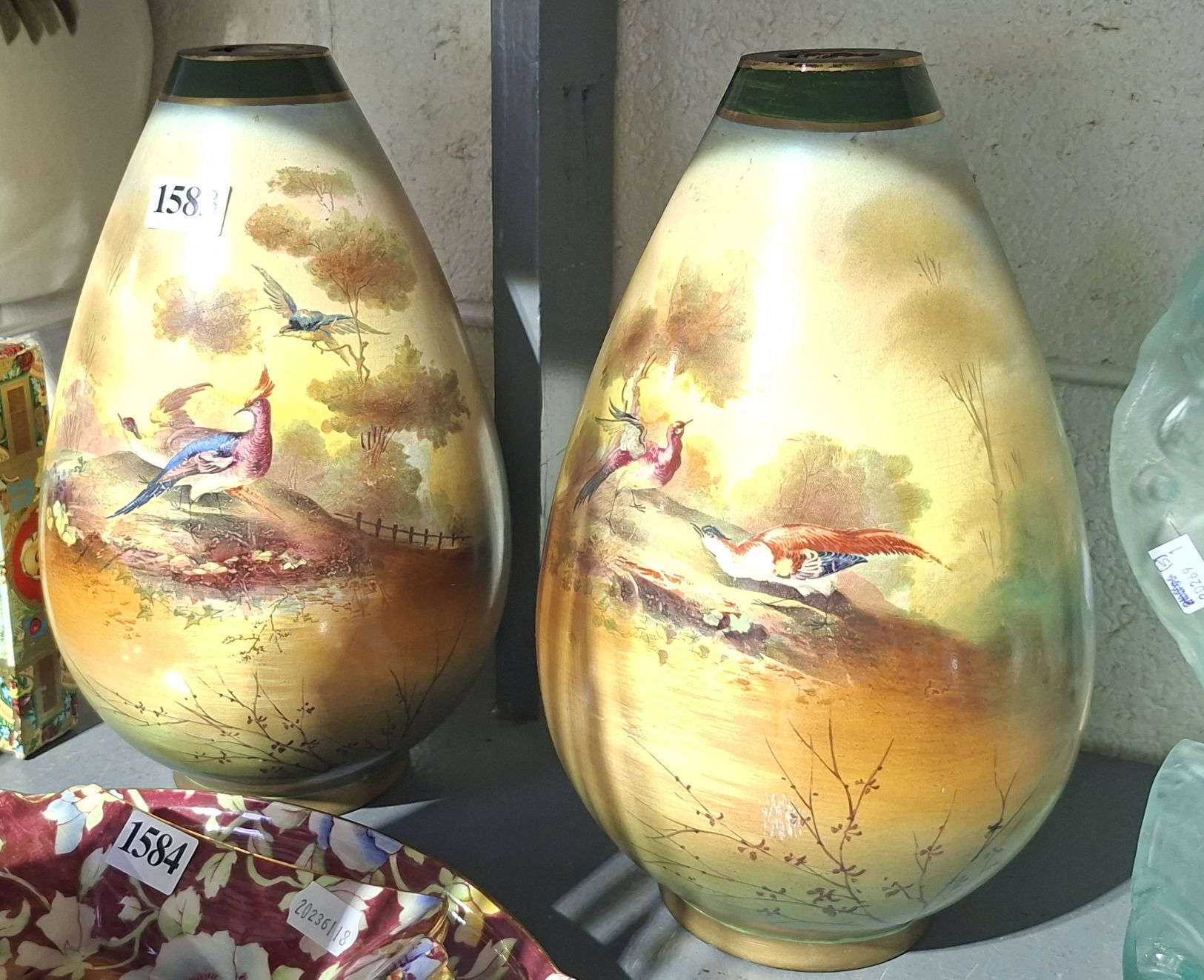 A Pair Of Antique Mantle Vases