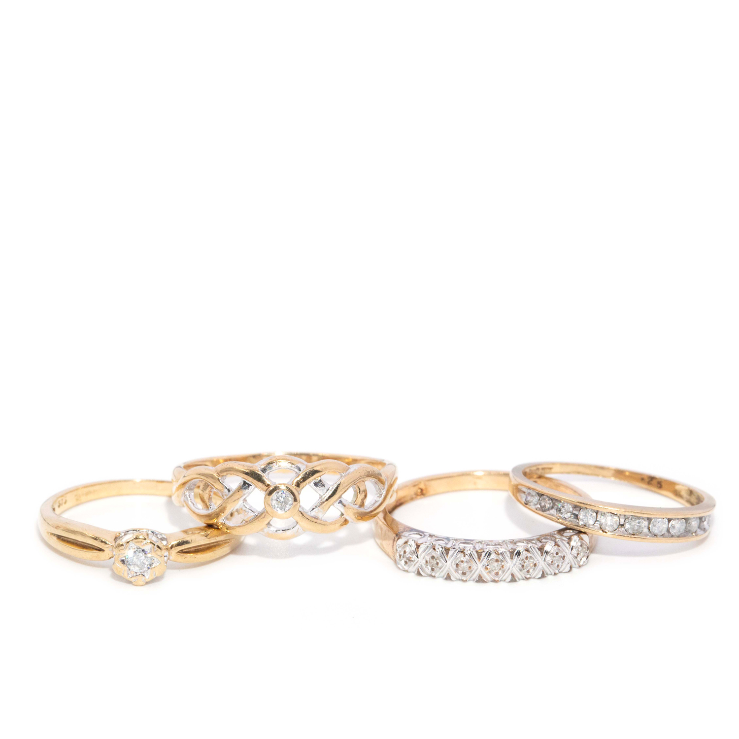 Four 9ct Gold Diamond Rings