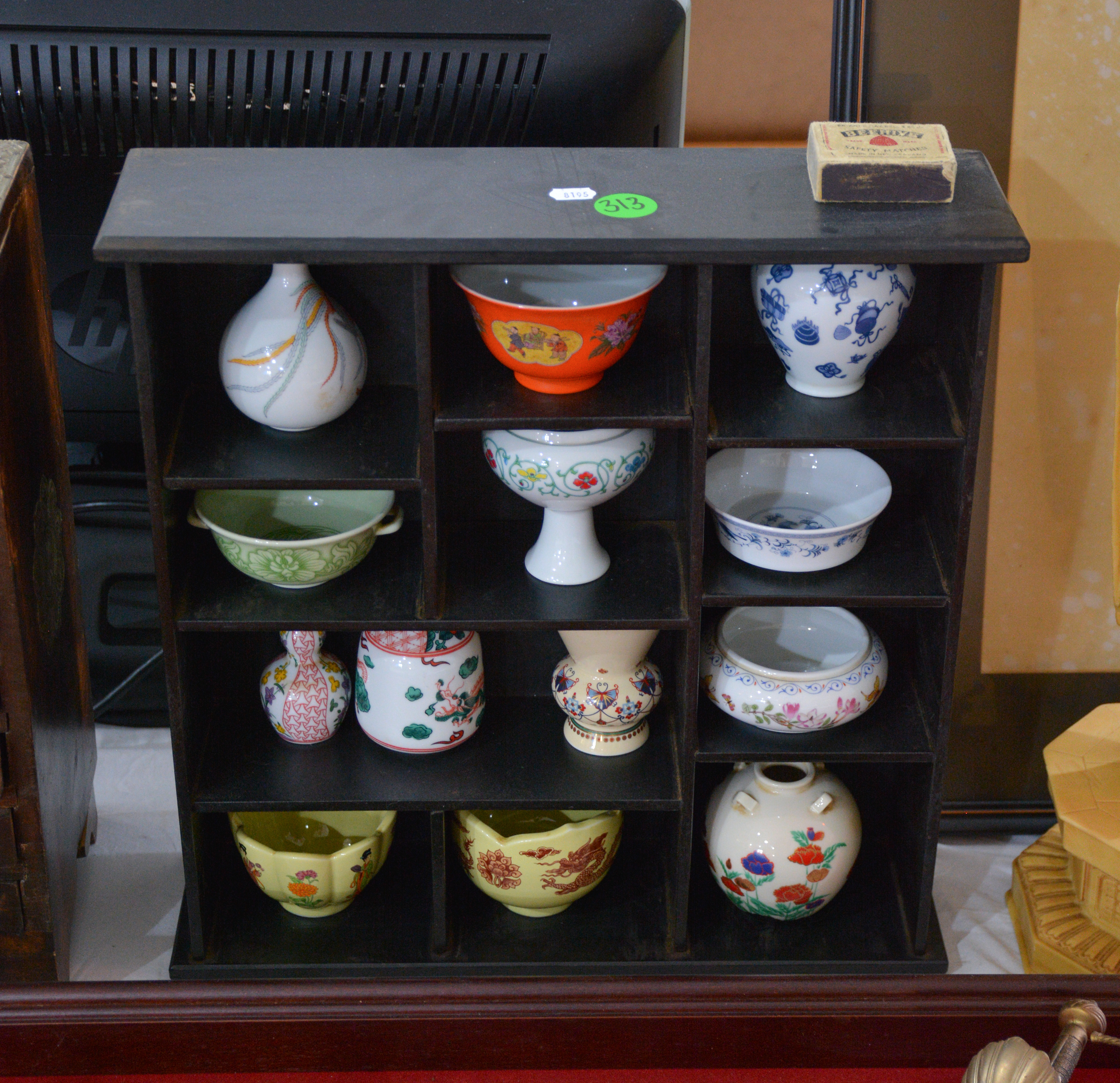 Small Black China Shelf and Contents — sold at auction in New Zealand for $25