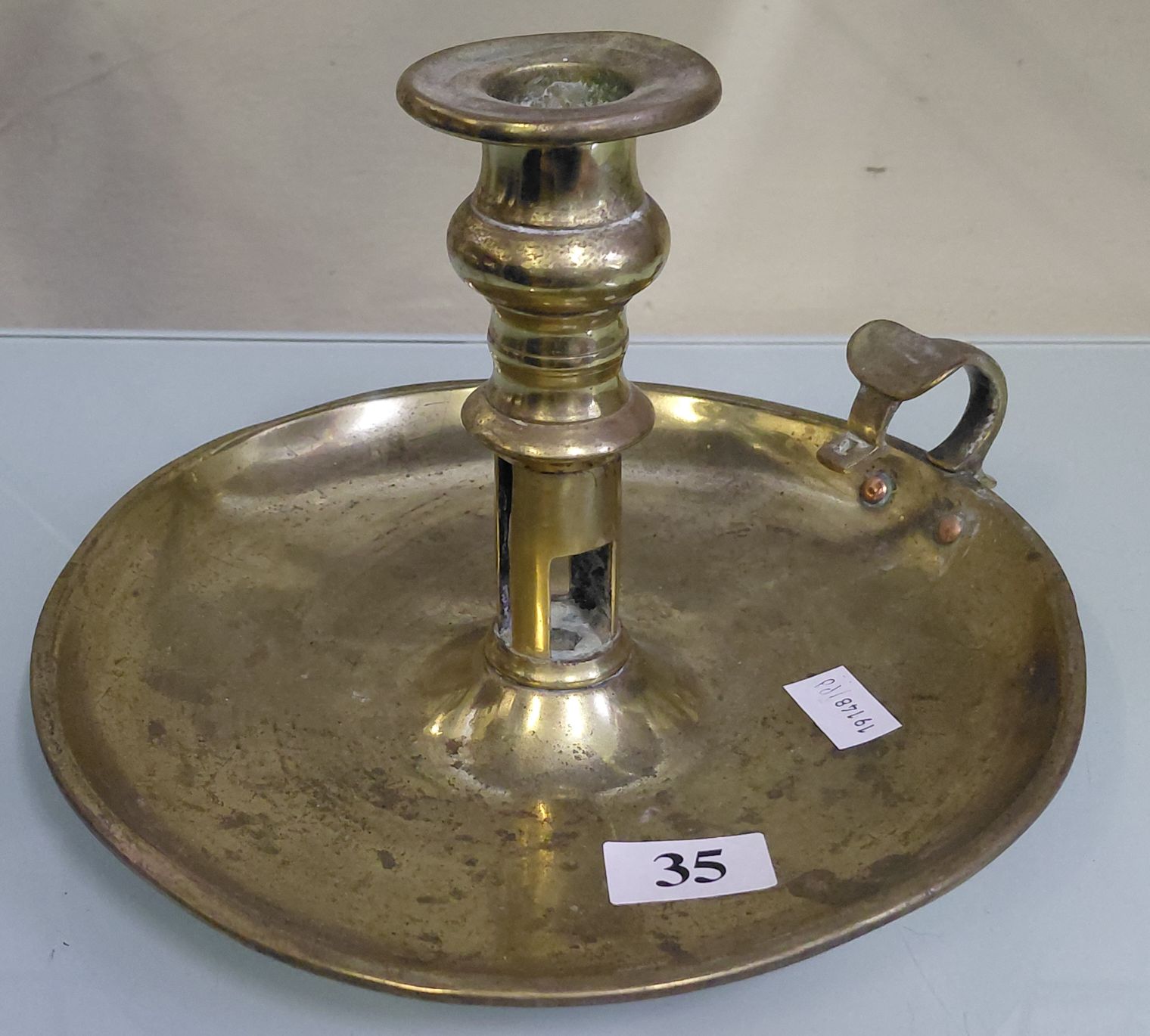 35 · BRASS CHAMBERSTICK