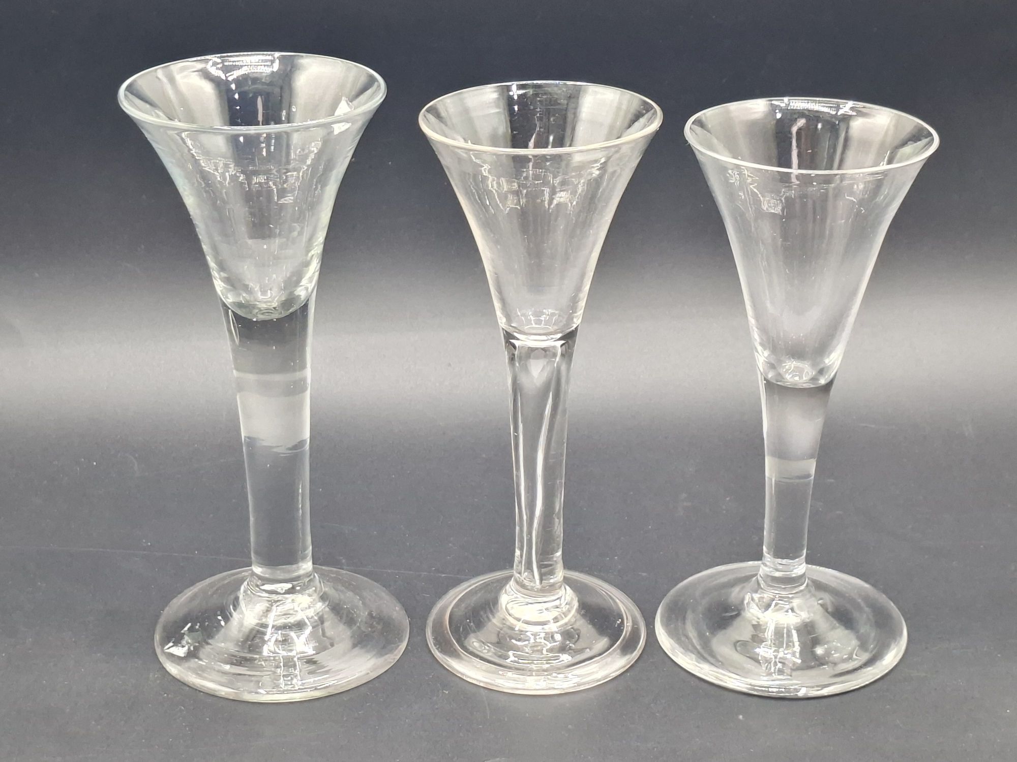 51 · 18TH CENTURY TRUMPET BOWL WINE GLASSES