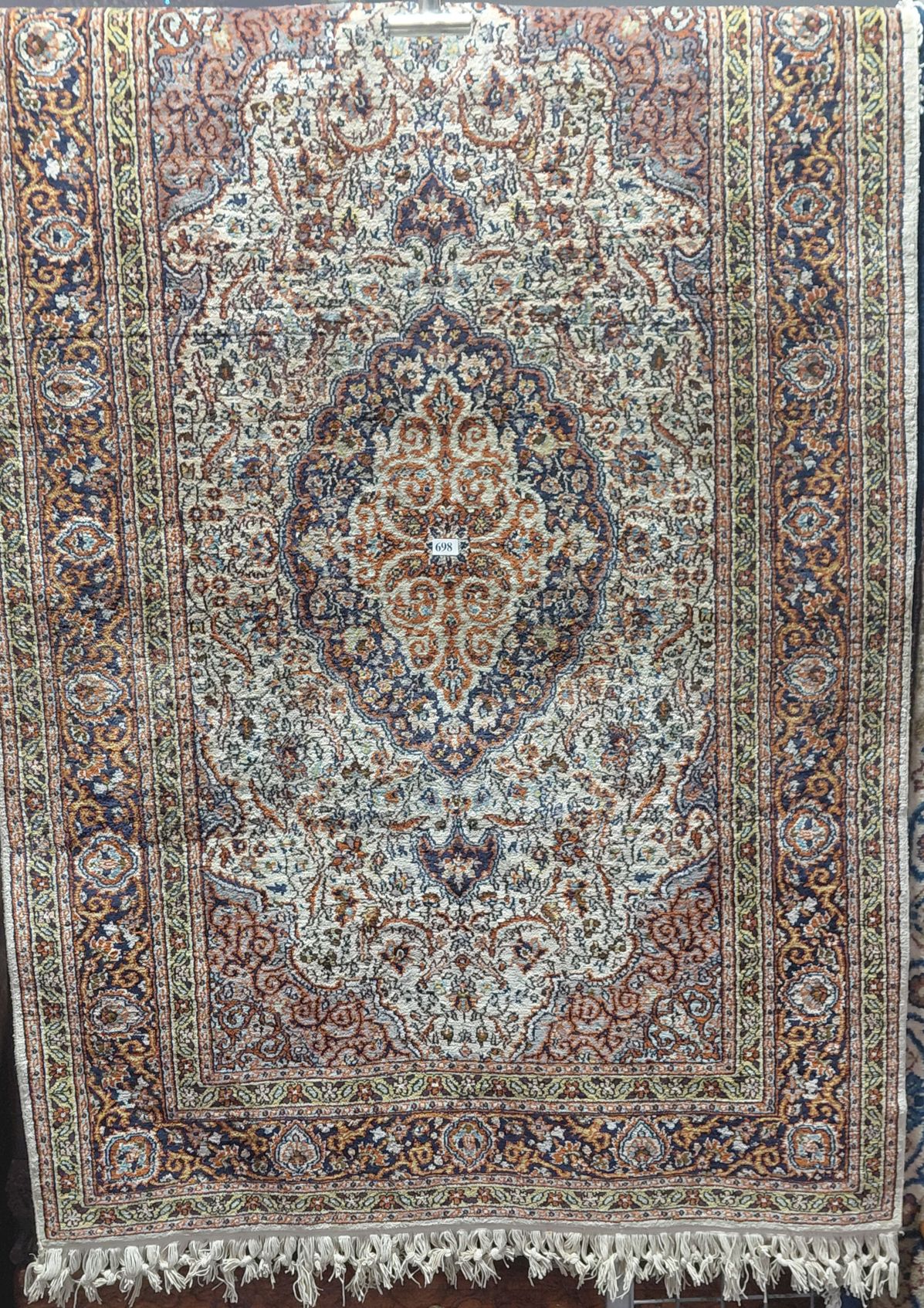 698 · HAND MADE RUG