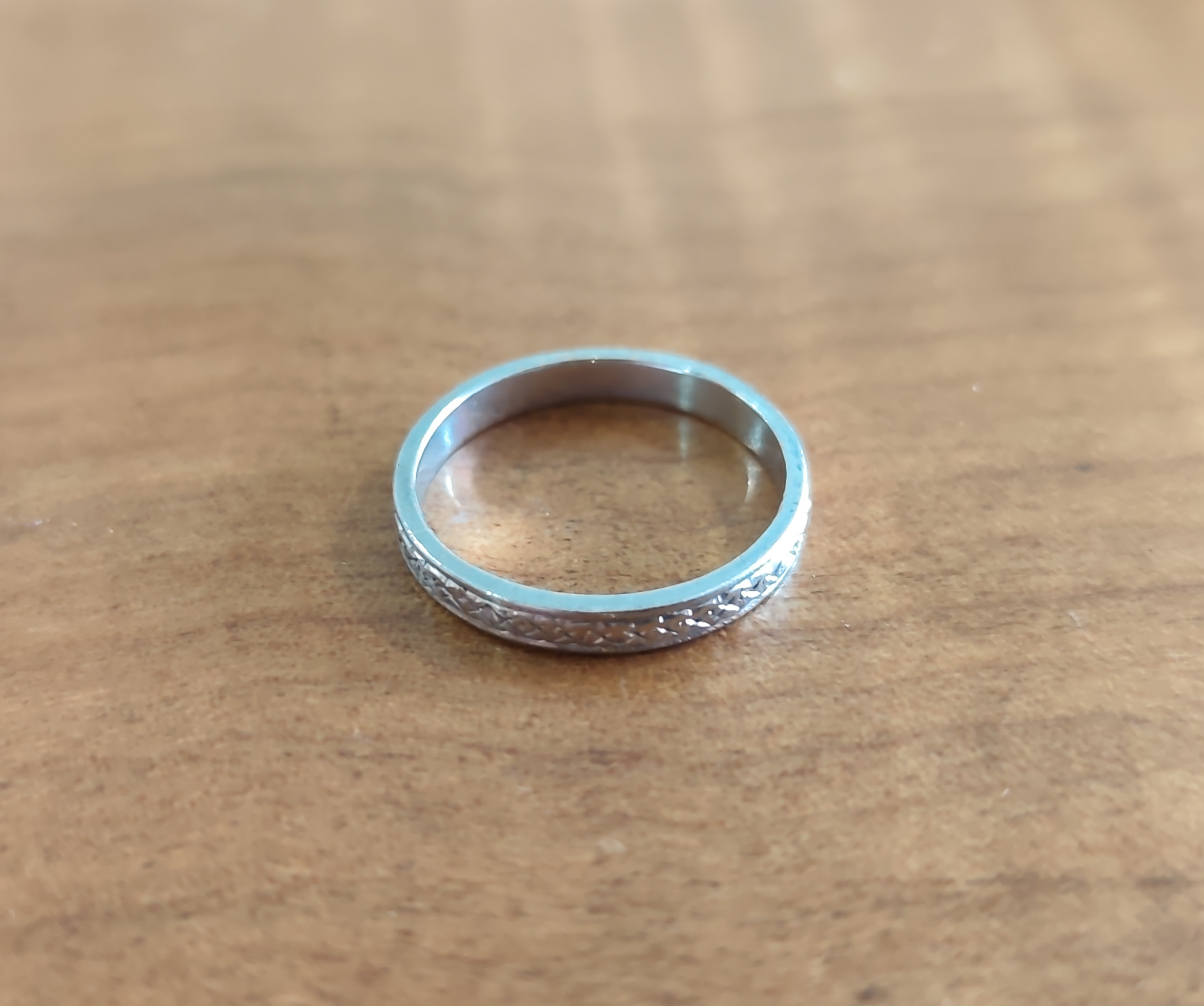 Engraved White Gold Ring Marked '9CT' — sold at auction in New Zealand for $200