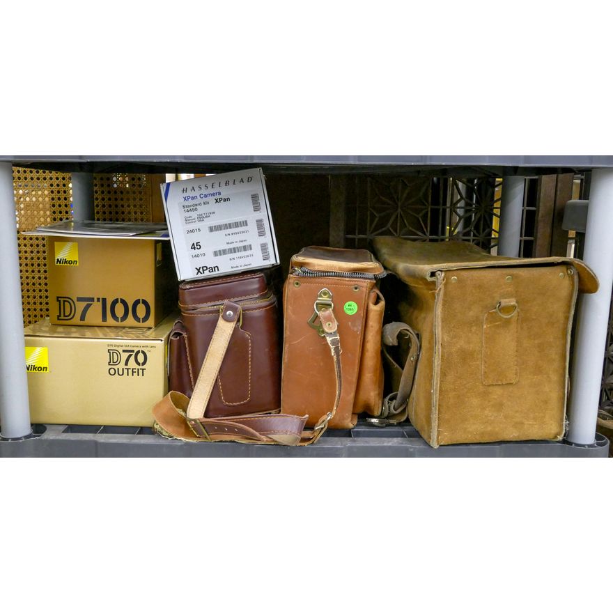 Shelf Old Camera Bags and Empty Boxes