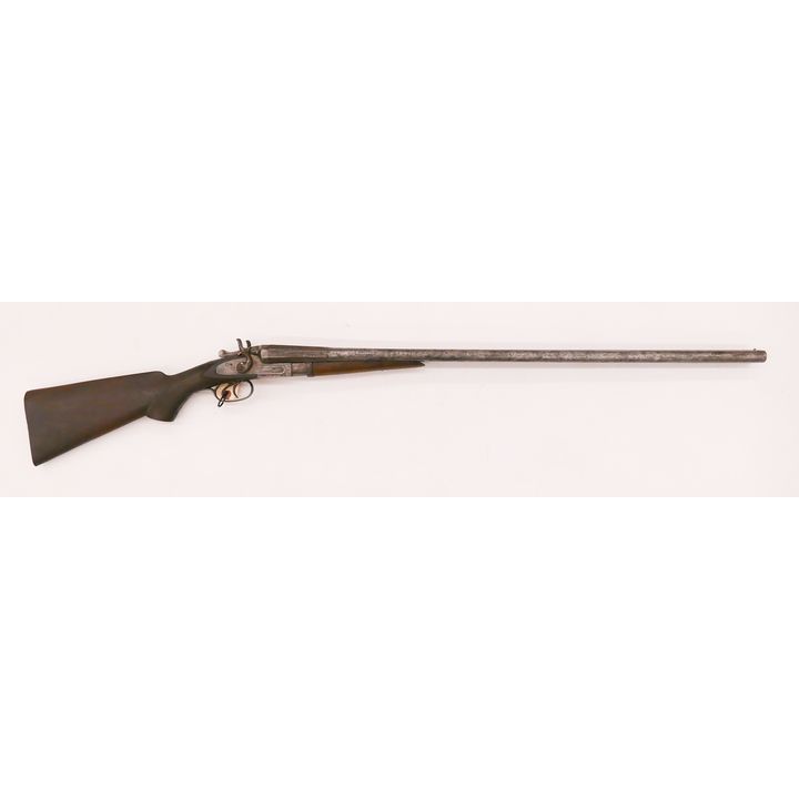 T. Barker Double Barrel Shotgun. Barrel measures 48''.