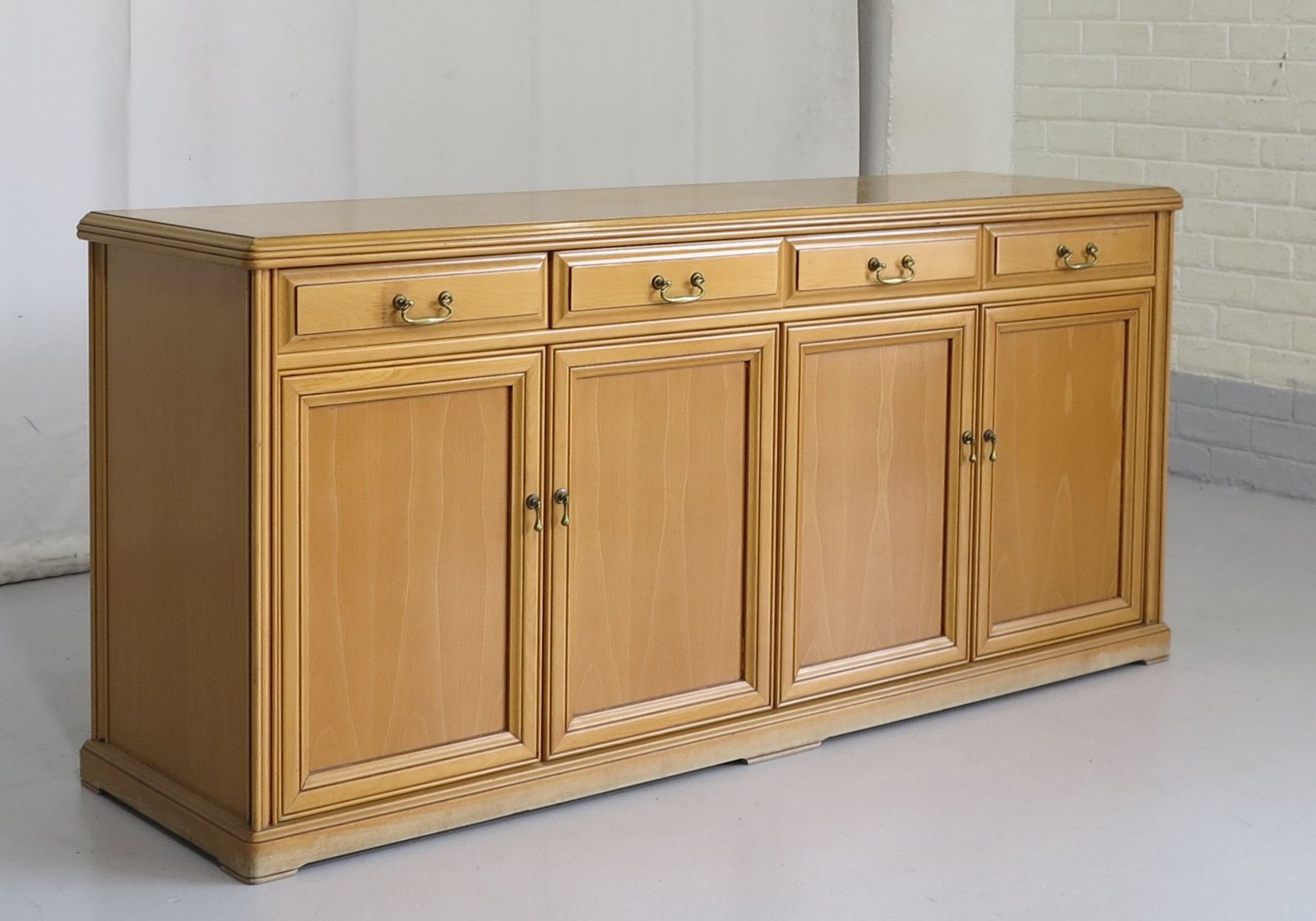 BEECHWOOD FOUR-DOOR SIDEBOARD | Westgate Walding Auctioneers