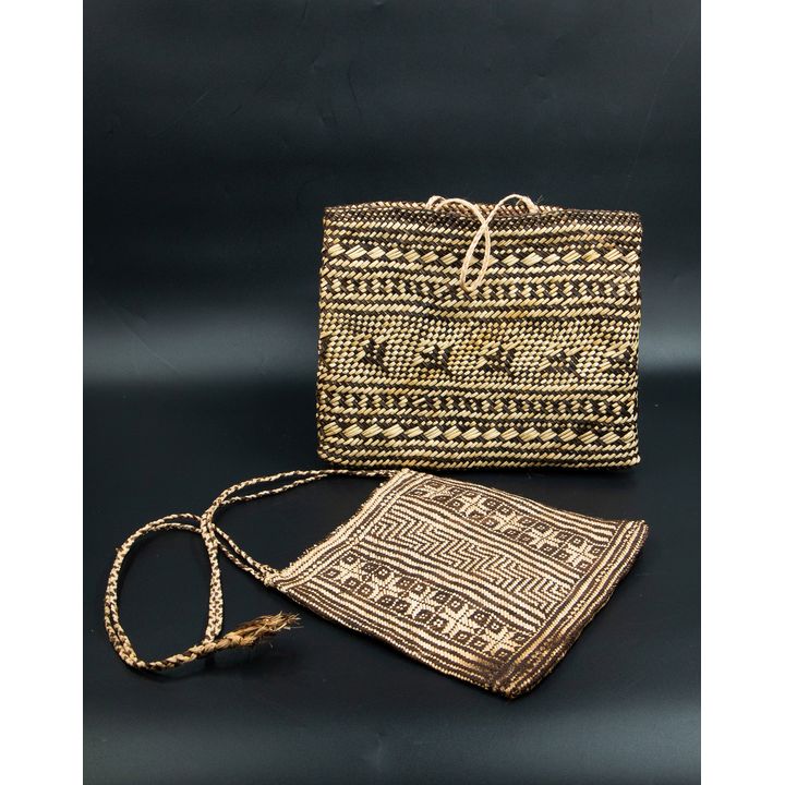 Two kete whakairo (patterned bag)