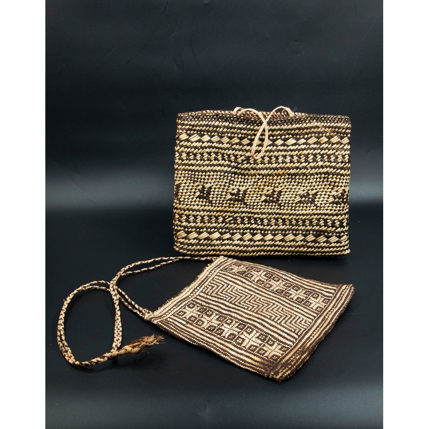 Two kete whakairo (patterned bag)