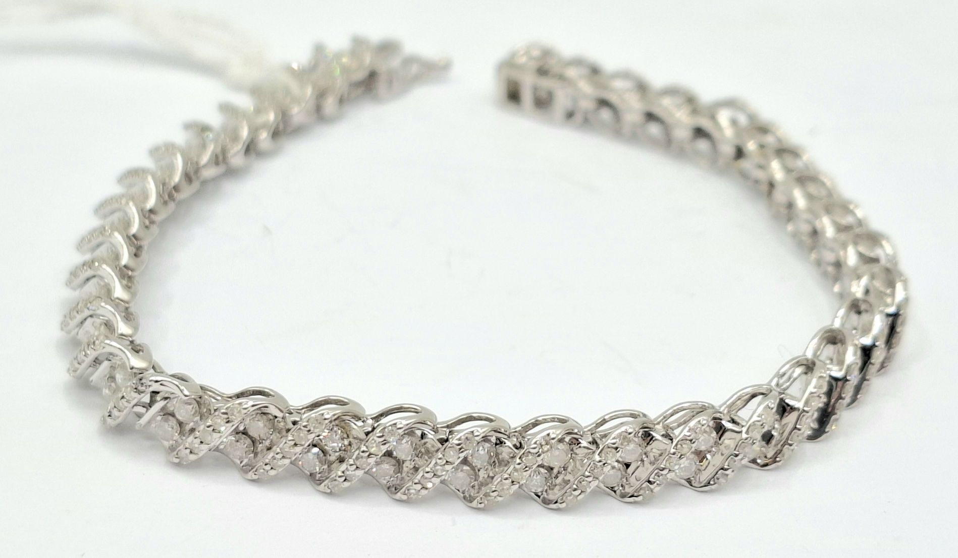 1151 · 14CT GOLD DIAMOND BRACELET