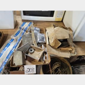 2 Boxes of assorted car chrome and other parts