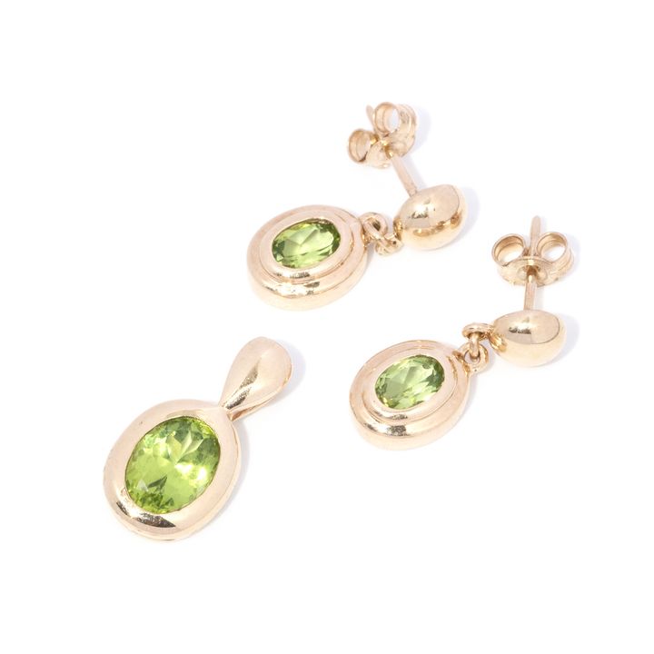 9 Carat gold peridot earring and pendant set